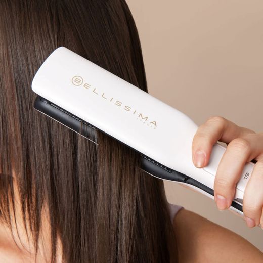 Bellissima Italia Steam Elixir Straightener BEL11865 Hair Straighteners - White / Gold - person straightening hair shot