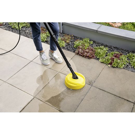 Kärcher K 3 eco!Booster Pressure Washer - Person cleaning flags