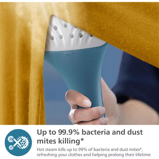 Philips STE1040/20 Handheld Garment Steamer - Green - Annotation - kills 99 % bacteria shot