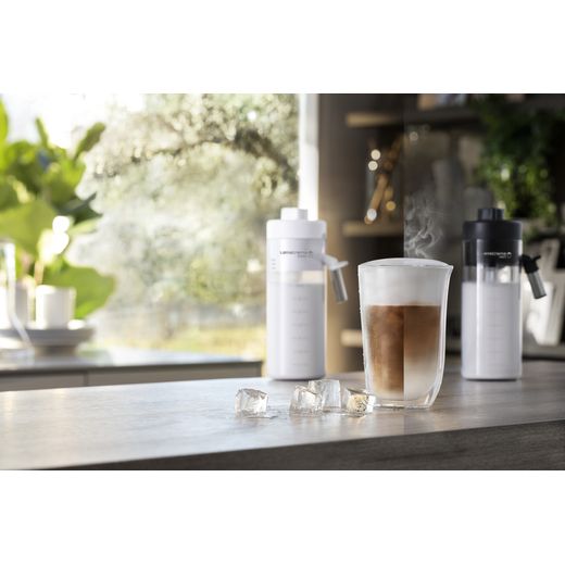 De'Longhi Eletta Explore ECAM450.86.T Bean to Cup Coffee Machine - Black - Coffee glass on table shot