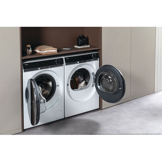 Haier HW110-BD14397U1 11kg Washing Machine with 1400 rpm - White - Washing machine and dryer in utility room shot