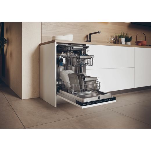 Haier I-Pro Shine Series 4 Integrated Slimline Dishwasher - Black Control Panel  - Dishwasher in kitchen with door open shot 