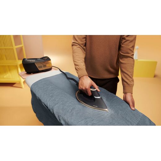 Philips PerfectCare 6000 Series Pressurised Steam Generator Iron - Gold / Black - Iron in use
