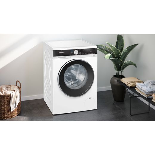 Siemens IQ-500 i-Dos™ 10.5Kg / 6.0Kg Washer Dryer - White - Washing machine in utility room shot
