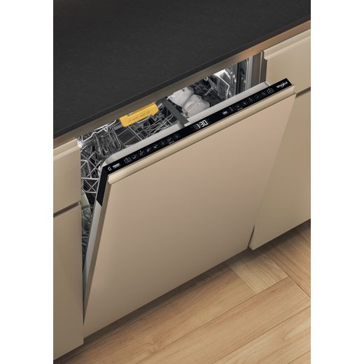 Whirlpool Standard Dishwasher - Black - Dishwasher in kitchen with door half open shot