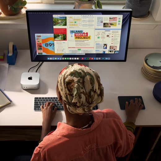 Apple Mac mini, - Silver - person on macbook
