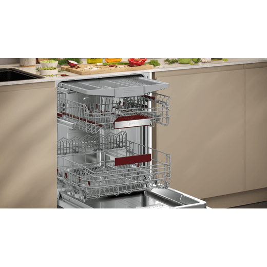 NEFF N 50 Integrated Standard Dishwasher - Silver - Dishwasher door open and racks out in kitchen