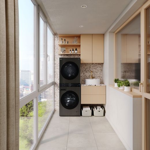LG WashTower™ AI Direct Drive™ WT1210BBTN1 Wifi Connected 12Kg / 10Kg Heat Pump Washer Dryer with 1400 rpm - Platinum Black - washer dryer in utility room shot