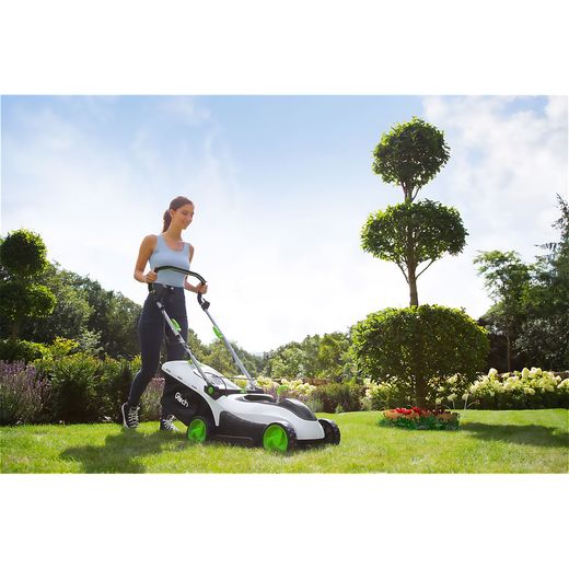 Gtech 1-05-020 Lawn Mower Green / White - Person mowing gras shot
