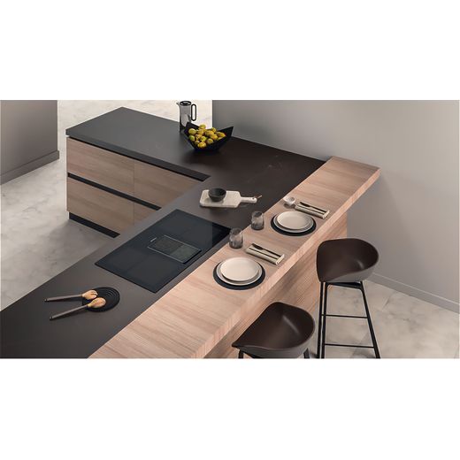 Hotpoint PVH92BK/FKIT 83cm Venting Induction Hob - Black - Hob in kitchen counter with plates set shot