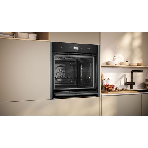 NEFF N90 Slide & Hide® Built In Electric Single Oven - Graphite  - Oven with door open shot