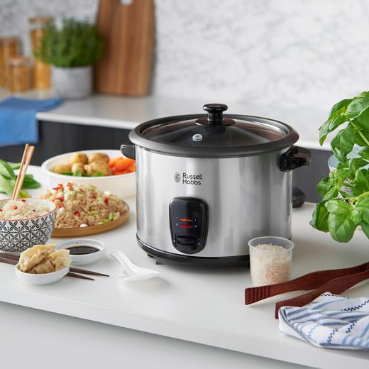 Russell Hobbs 19750 1.8 Litre Rice Cooker - Stainless Steel - Rice cooker on worktop surrounded by food