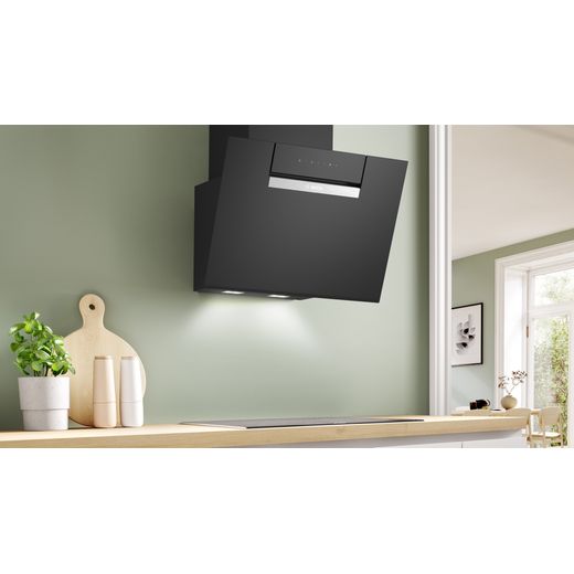 Bosch Series 4 DWK67FN60B Chimney Cooker Hood - Black - Cooker hood on wall above hob shot