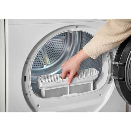 Bosch Series 6 WQG24502GB 9Kg Heat Pump Tumble Dryer - White - women changing filter shot