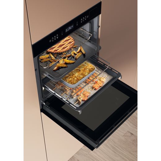 HOI6A8PT1SBUK_BK - Oven cooking food in kitchen shot 
