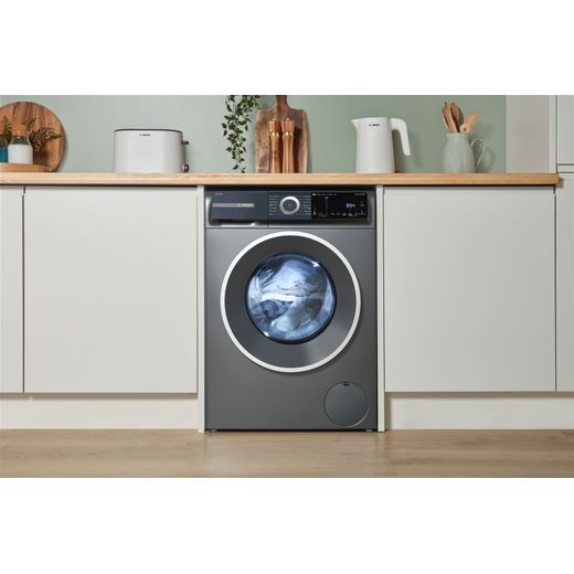 Bosch Series 6 i-Dos WGH254ARGB 10kg WiFi Connected Washing Machine with 1400 rpm - Graphite - machine in kitchen shot