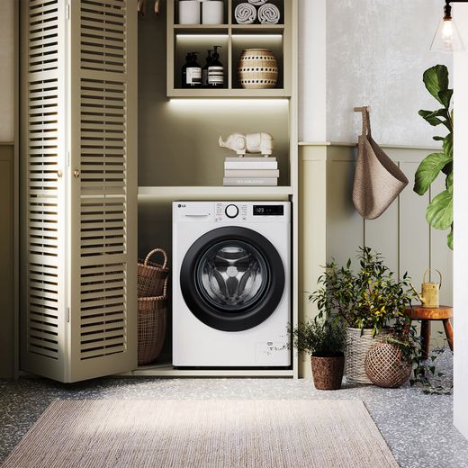 LG Series 4 AI Direct Drive™ F4Y510WBLN1 10kg Washing Machine with 1400 rpm - White - Washing machine in room