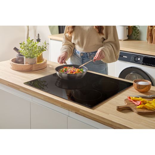 Bosch Series 4 PIE631BB5E 59cm Induction Hob - Black - Hob in kitchen shot