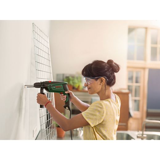 UniversalImpact 730 Bosch 0.603.313.470 Cordless  - Women using drill shot