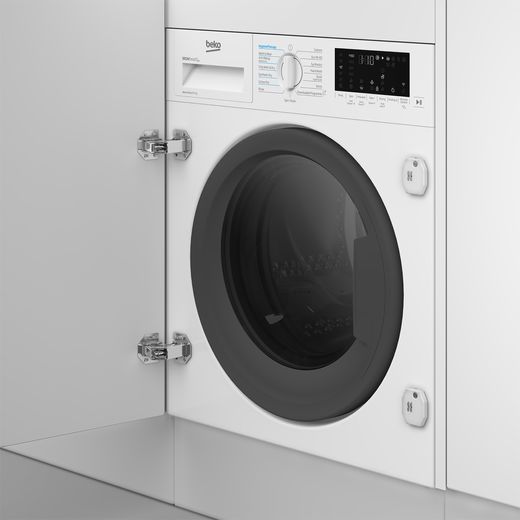 Beko RecycledTub® Integrated 9Kg / 5Kg Washer Dryer - White - Washer dryer in kitchen cupboard shot