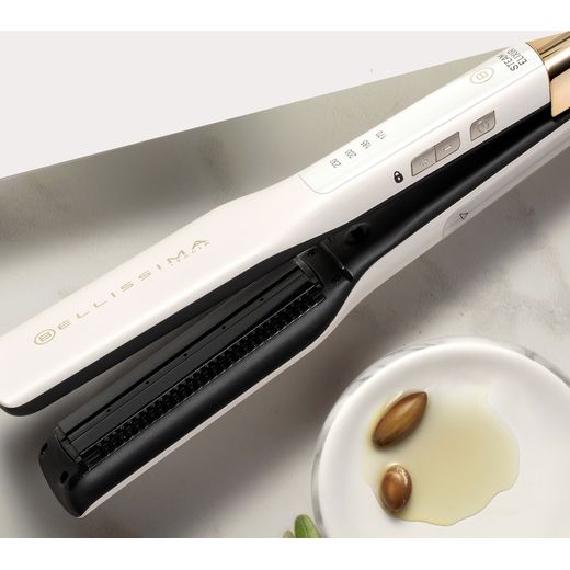 Bellissima Italia Steam Elixir Straightener BEL11865 Hair Straighteners - White / Gold - Hair straightener on table shot
