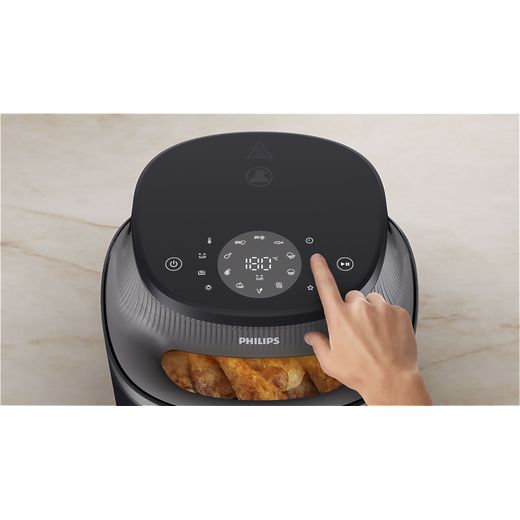 Philips 3000 Series NA342/09 Air Fryer - Black / Gold - Person using air fryer shot