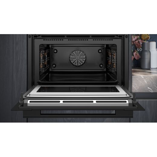 Siemens IQ-700 Compact Electric Single Oven - Black - Close up oven cavity in kitchen shot