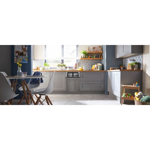 Beko Fully Integrated Slimline Dishwasher - Silver Control Panel with Fixed Door Fixing Kit - Dishwasher in modern kitchen with dining table