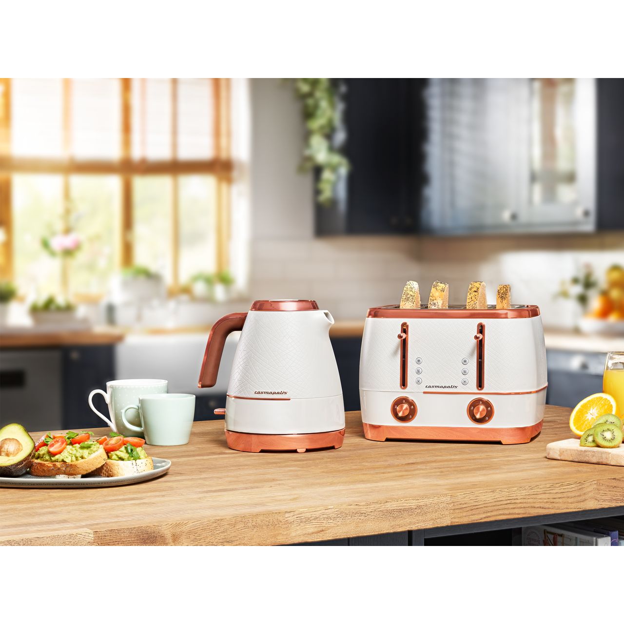 white and copper kettle and toaster set