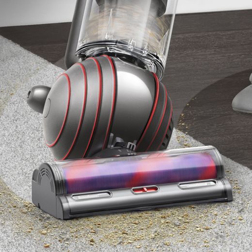 Dyson Ball Animal Origin Upright Vacuum Cleaner - vacuum cleaning up mess shot