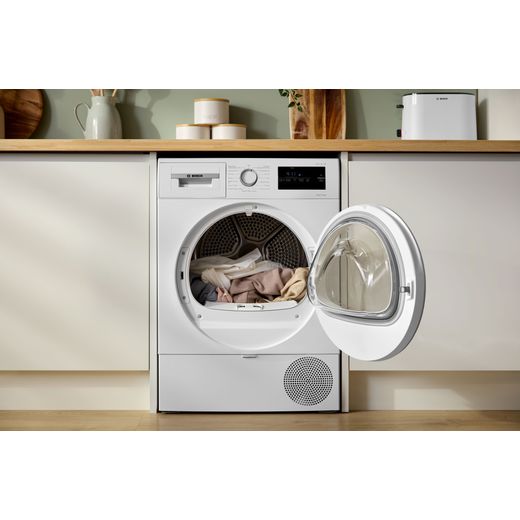Bosch Series 4 WTH85226GB 8Kg Heat Pump Tumble Dryer - White  - washing machine in kitchen shot