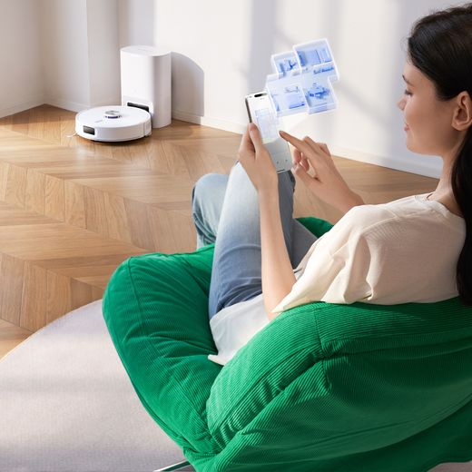 Narwal Freo S Robotic Vacuum Cleaner - White - Vacuum in docking station shot