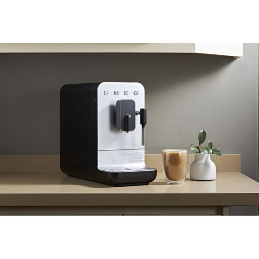 Smeg BCC12BLMUK Coffee Machines Matt Black - Coffee machine on kitchen table shot