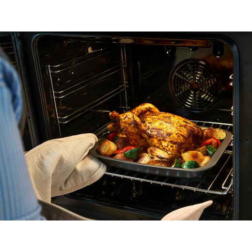 Belling Farmhouse 100E 100cm Electric Range Cooker with Ceramic Hob - Black - Food cooking in grill shot