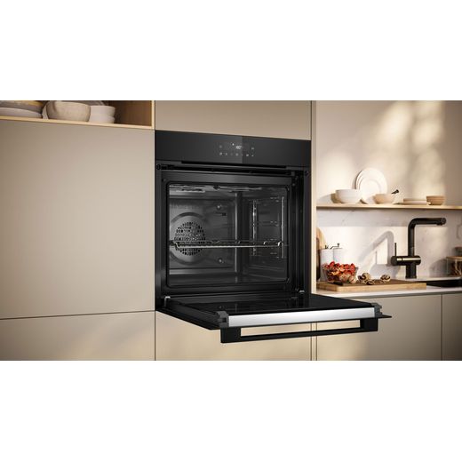 NEFF N30 B2CCJ7AK0B Built In Electric Single Oven - Black - Oven with door open in kitchen shot
