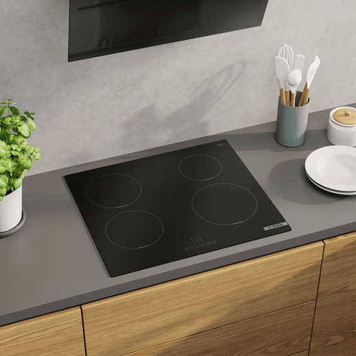 Bosch Series 4 PIE61ABB5E 59cm Induction Hob - - lifestyle - top angled view of hob in kitchen