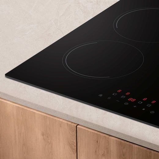 Candy Idea CII647CCAR 59cm Induction Hob - lifestyle - close up of front left corner showing residual heat indicator
