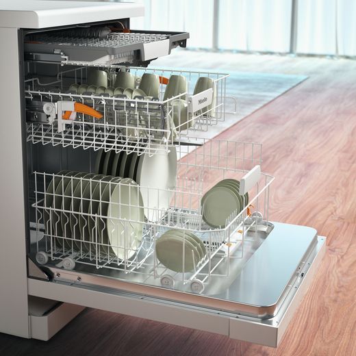 Miele Standard Dishwasher - White -0 Close up door open in kitchen shot