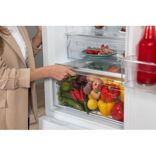 Bosch Series 4 60/40 Frost Free Fridge Freezer - White - person opening drawer shot