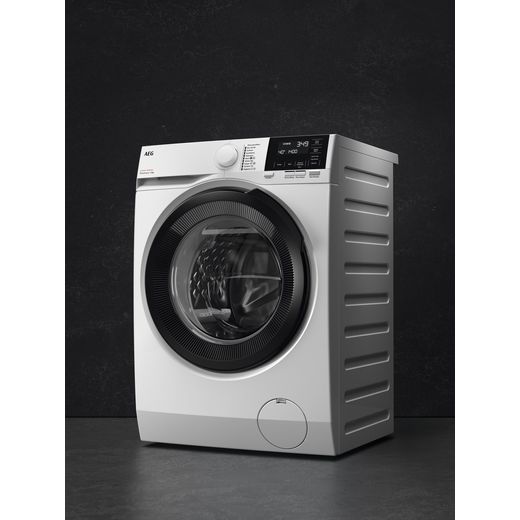 AEG ProSteam® Technology 8Kg Washing Machine - White - Washing machine in dark room