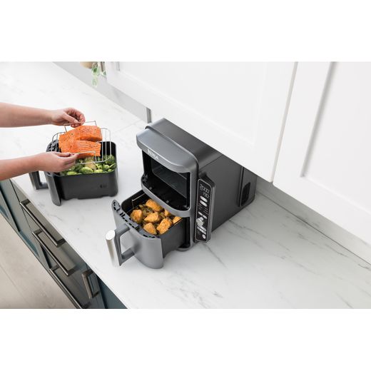 Ninja Foodi Max Dual Zone SL400UK - Black - Air fryer cooking food in kitchen
