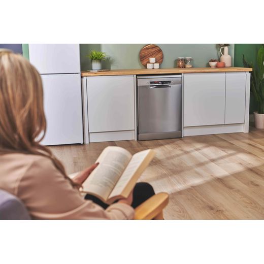 Bosch Series 4 Standard Dishwasher - Silver Inox - Woman reading book