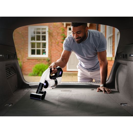 Gtech Multi Platinum 1-03-274 Cordless Vacuum Cleaner with up to 30 Minutes Run Time - Silver / Black - Man hoovering boot shot