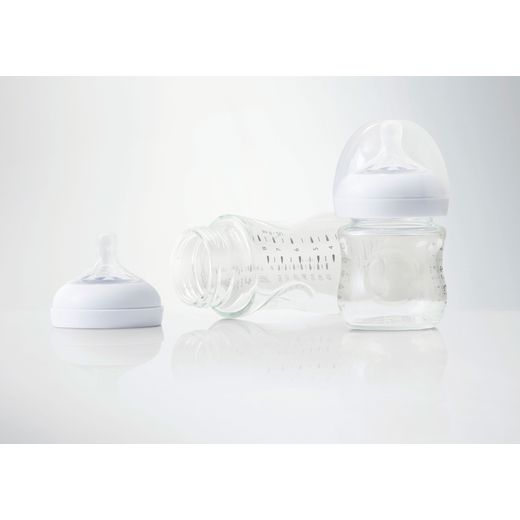 Fisher & Paykel Series 7 Fully Integrated Standard Dishwasher - Black - Baby bottle on table shot