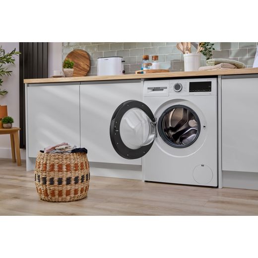 Bosch Series 6 WGG254Z1GB 10kg Washing Machine with 1400 rpm - White - washing machine in kitchen with door open  shot