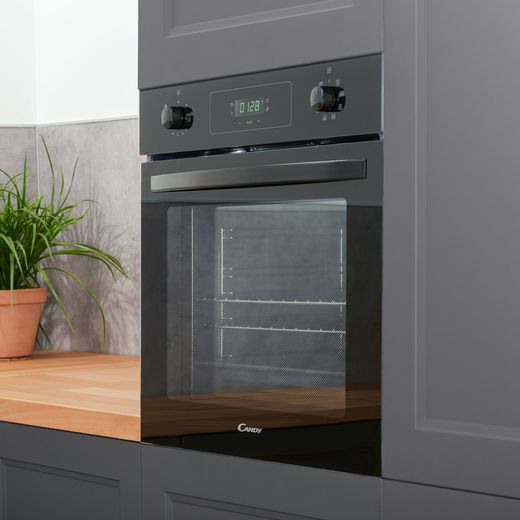 Candy Idea Built In Electric Single Oven - Black - Oven in kitchen cupboard shot