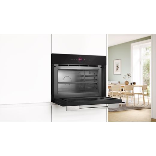 Bosch CEG732XB1B Built In MW only - Black - Microwave in kitchen with door open shot