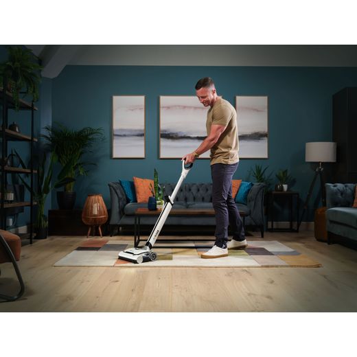 Gtech AirRAM 3 1-03-270 Cordless Vacuum Cleaner with up to 30 Minutes Run Time - White - Man hoovering floor shot