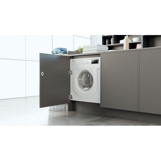 Hotpoint Integrated 7Kg Washing Machine - White - Washing machine in modern laundry room