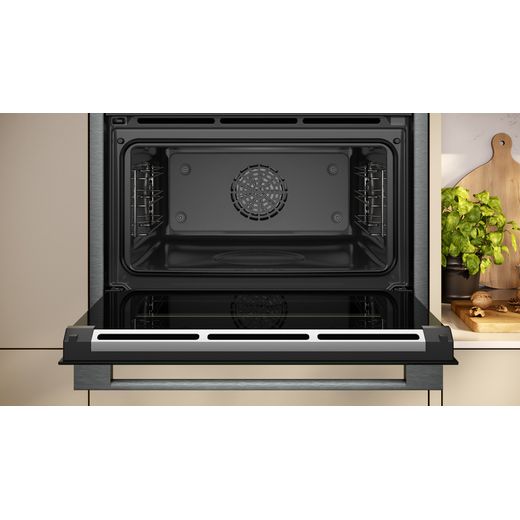 NEFF N90 Compact Electric Single Oven - Graphite - Oven with door open showing inside cavity shot
